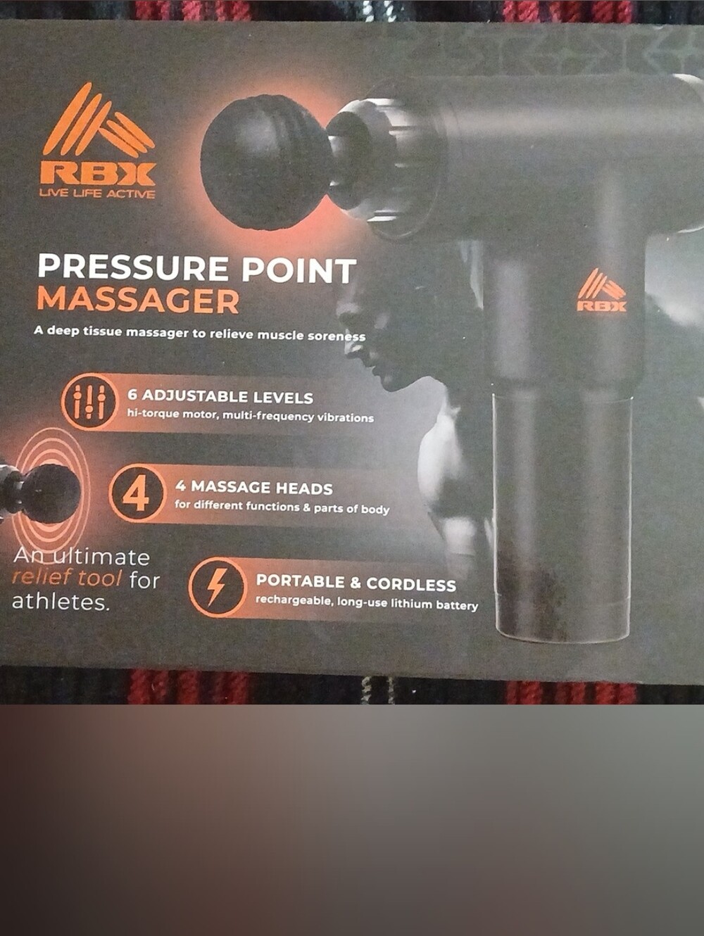 RBX Black Massage Gun with Orange Logo Accent